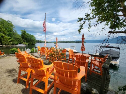 Tables and chairs with umbrellas